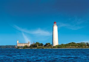 A unique image showing the Lighthouse and Terminals together, taken from a boat on the northwest side of the structures. This photo has not been manipulated; it shows the two buildings as they appear from that vantage point.