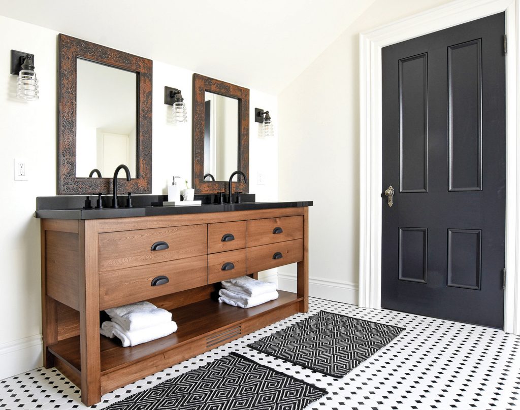 cup pulls in flat black set off this bathroom by Batteaux Creek Kitchens, designed by Marina Farrow of Farrow Arcaro Design.
