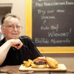 Don Robertson of Black Angus in Thornbury shows off the beauty of a great burger.