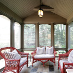 The screened porch off the living room was added during the post-fire renovation.
