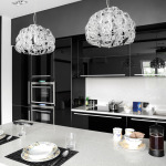 High-gloss, polyurethane cabinets take the contemporary look up another notch (especially in dramatic black), while creative lighting options are as beautiful as they are functional.