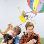 Fran Bernard (left) and Karen Fawcett are regular volunteers at the Collingwood Animal Shelter, which houses up to 100 cats in a bright and cheery communal ‘cat room.’
