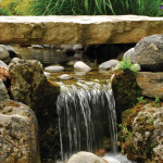 Beneath this natural-looking water feature is a well-concealed concrete foundation.