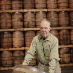 John Redman, a warehouse operator at Brown-Forman in Collingwood, with one of the white oak barrels in which Collingwood Whisky is aged and mellowed with maple.