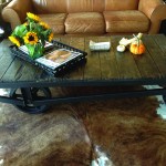 This stunning coffee table is a perfect example of upcycling. Lisa Proctor of Baywood Designs in Thornbury had a client who was looking for a table for a large, open-concept great room. Proctor found an old foundry cart in a quonset hut filled with antiques and old stuff. “These carts were meant for hauling stuff around, it wasn’t meant to look pretty, but as soon as I saw it, I knew it would be perfect,” says Proctor. “It was about six feet by three feet – the perfect size – and I could see that the bones were good, the structure was good.” Proctor simply sanded the top and used hemp oil to bring out the natural wood, and repainted the steel base and wheels using wood stove paint. “The client just loves it,” says Proctor. “She rolls it out of the way when she has a party and creates a dance floor.”