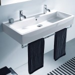 The Durafit Double Vero washbasin, an extra-wide china vessel sink with two separate faucets and one common drain, can be mounted on a wall or in a countertop.