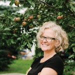 Food writer and caterer Emily Worts with her family’s beloved apple tree. Beginning with this issue, Emily will be contributing a regular food column to On The Bay.