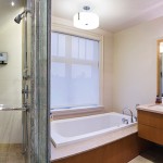 Custom vanities in the master bathroom were made by Bernard Rioux, a cabinetmaker from Thornbury.