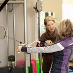 Senior physiotherapist and co-director of the Collingwood Sport Medicine and Rehabilitation Centre, Julie Moss-Kujala (left) works with clients on exercise to lighten the load on weight-bearing joints (hips, knees and feet) and strengthen the muscles around the joints to help them stay active.