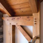 Ceiling-high windows in the great room take in the wintry scene. Inspired by years of designing luxury chalets in Whistler, architect Alex Rebanks chose BC Timberframe for the post and beam in the Canavans’ winter home. Made of Fraser fir, the beams are structural, not merely cosmetic.