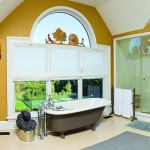 Vaulted ceilings and a window with “the best view in the house” give the master bath an open feeling.