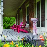 The front porch of the classic centre hall brick farmhouse, built in the 1850s.