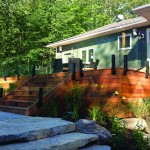 The Landmark Group built this deck using ipe (Brazilian walnut), an incredibly durable hardwood that is three times harder than cedar and with the same fire rating as steel. The custom glass railings use a short-post railing system for an unobstructed view.
