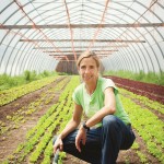 Gillian Flies, in one of the greenhouses at The New Farm, calls herself a “food activist” who believes that high-quality, fresh food is a human right.