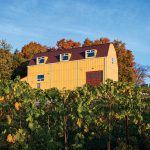 The new 9,000-square-foot barn serves many purposes including storage for their heavy machinery and wine-making equipment.