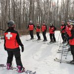 Patrollers at Alpine Ski Club gather before “closing sweep” at the end of the day: Angela Sibbald, Shanna Reid, Susie Shymko (facing away), Paul Aitkens, Jackie Bizzell, Judy Ross, John Ackery, Paul Eichenberg, Jim Ross, Ailie Young, Andrea Vincze.