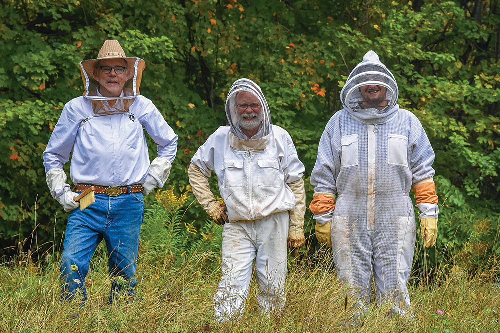 Harvesting the honey (l-r): Brent Flanakin, Richard Elzby and Jacob Smith.