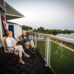 Rosi Smith and Milan Somborac enjoy their waterfront setting. The views from their balcony take in the expansive grounds and Collingwood shoreline.