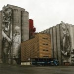 a mural on grain terminals by Guido van Helten, Helsinki, Finland