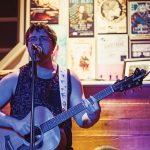 Austin Benwell plays for diners at the Bruce Wine Bar