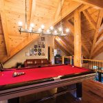 The play loft, with its billiard table, is a favourite gathering place for neighbourhood teenagers. The music theme is a legacy of Paul’s dad, a rock and roll radio pioneer in Montreal.