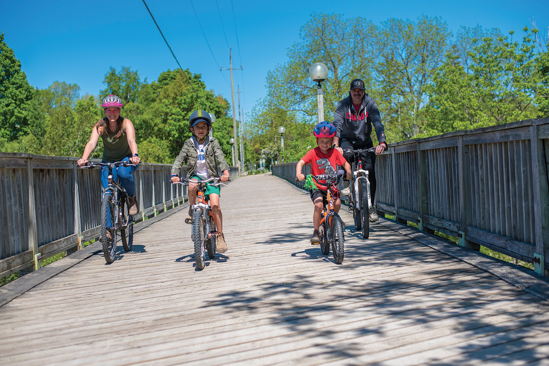 he McDonald Family – Jen, Kent, Cooper and Mason – have some well-deserved treats from the Thornbury Bakery Café after a ride along the wooden bridge that crosses the Beaver River in Thornbury.