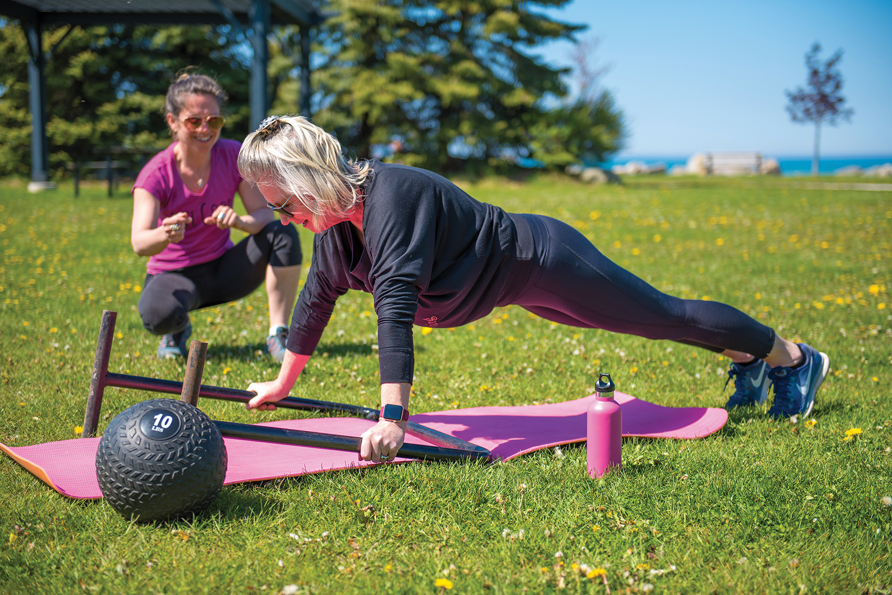 Good Energy Coach Sarah Heipel takes her client Clare Naumovski through a bootcamp workout session at Sunset Point Park in Collingwood.