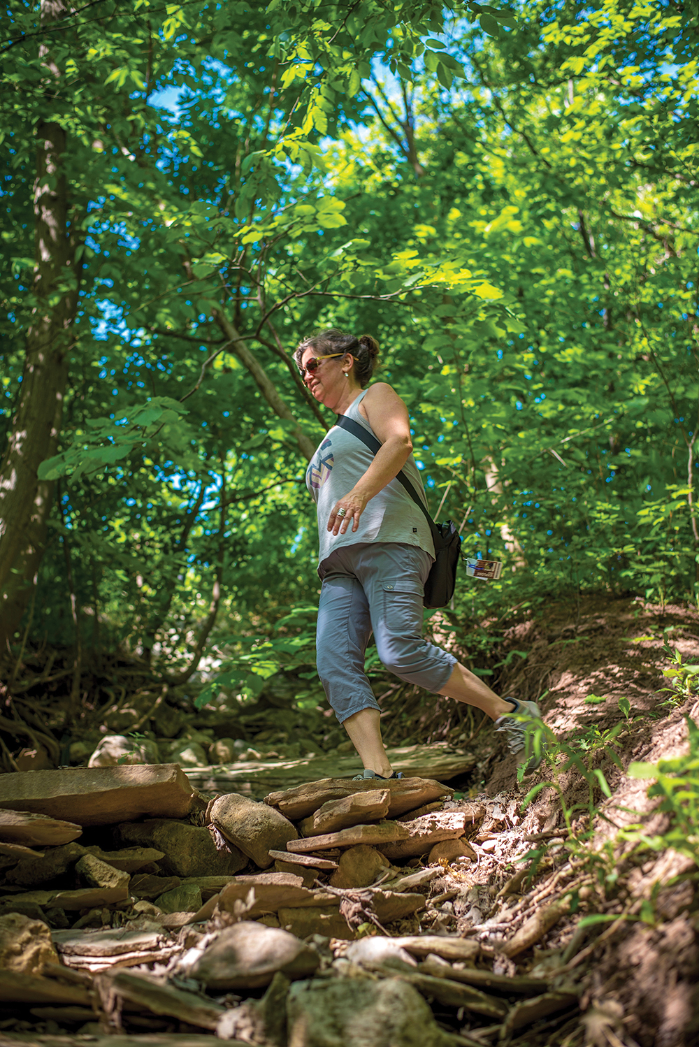 Susan Brindisi hikes The Grind at Blue Mountain Resort, one of 21 hiking and multi-use trails of varying degrees of difficulty open for hikers who have purchased a day pass or have a 5x7 or Ikon season pass for the 2021 season.