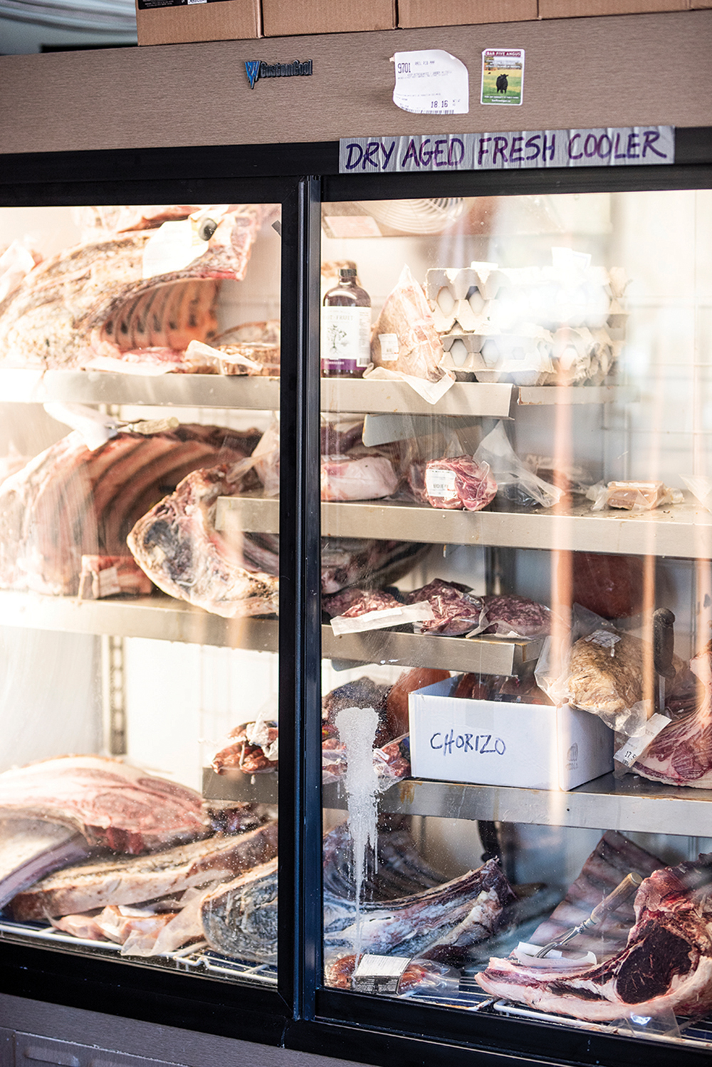Sean Kelly, owner of Black Angus Fine Meats & Game in Craigleith, cuts meat to order and also offers a variety of frozen meats and prepared foods.
