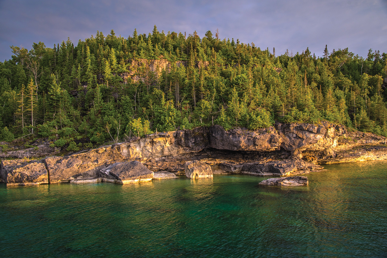 Tobermory, at the tip of the Bruce Peninsula, is a picturesque town featuring beautiful views of water, harbours and cliffs.