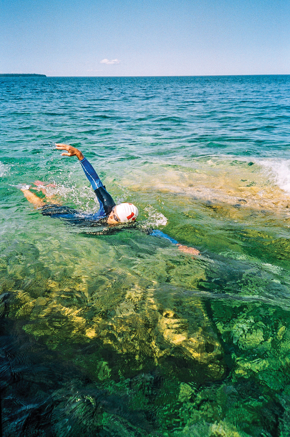 Micaela von Richthofen swimming in the crystal clear waters of Georgian Bay near Tobermory.
