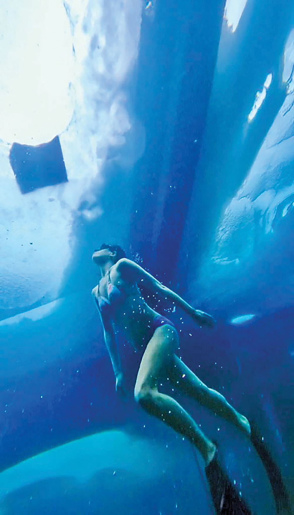 Below the ice without a wetsuit—Lilly Ryzebol in Lion’s Head Harbour, February 2022.