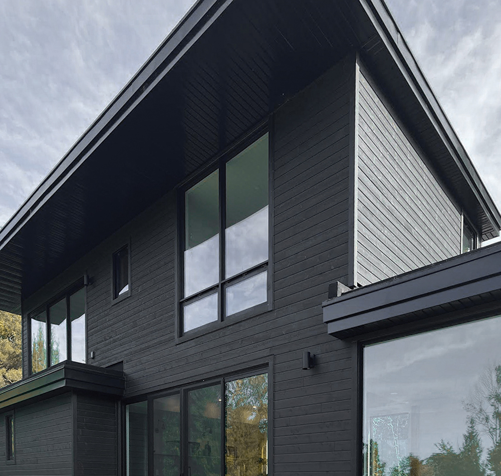 Black wood siding from Maibec completes the look. At just 1,638 square feet, the couple actually had to add some square footage to meet the requirements for new builds in the area.