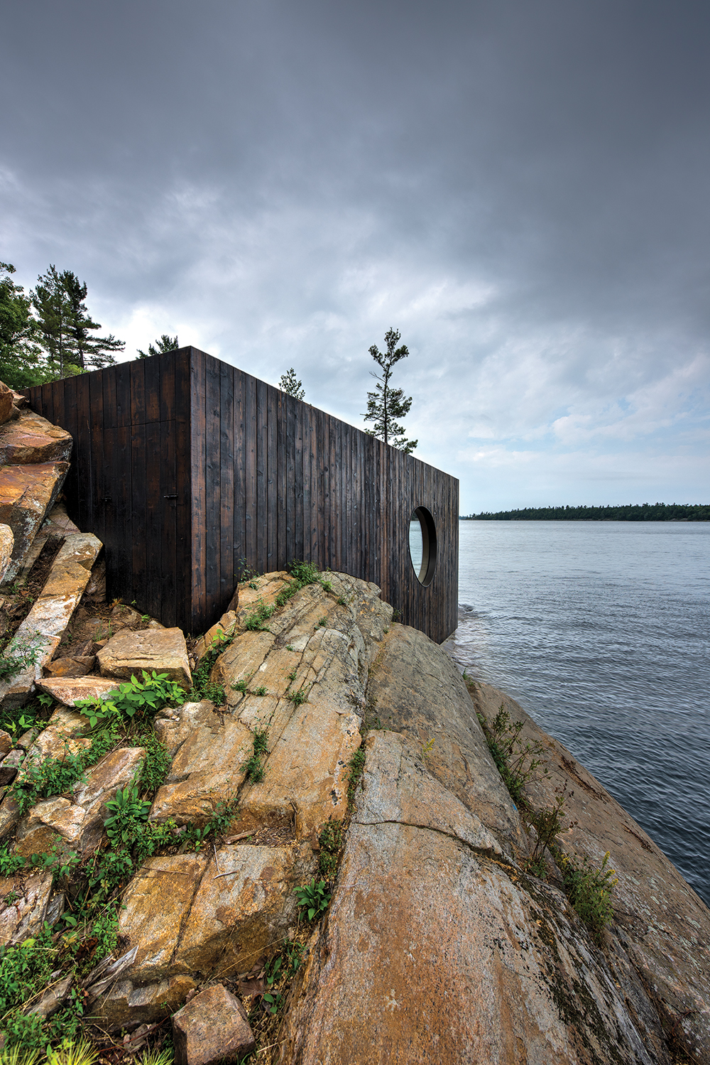 A cold plunge following a sauna is generally recommended. This beautiful architectural sauna rests just above Georgian Bay for that purpose.