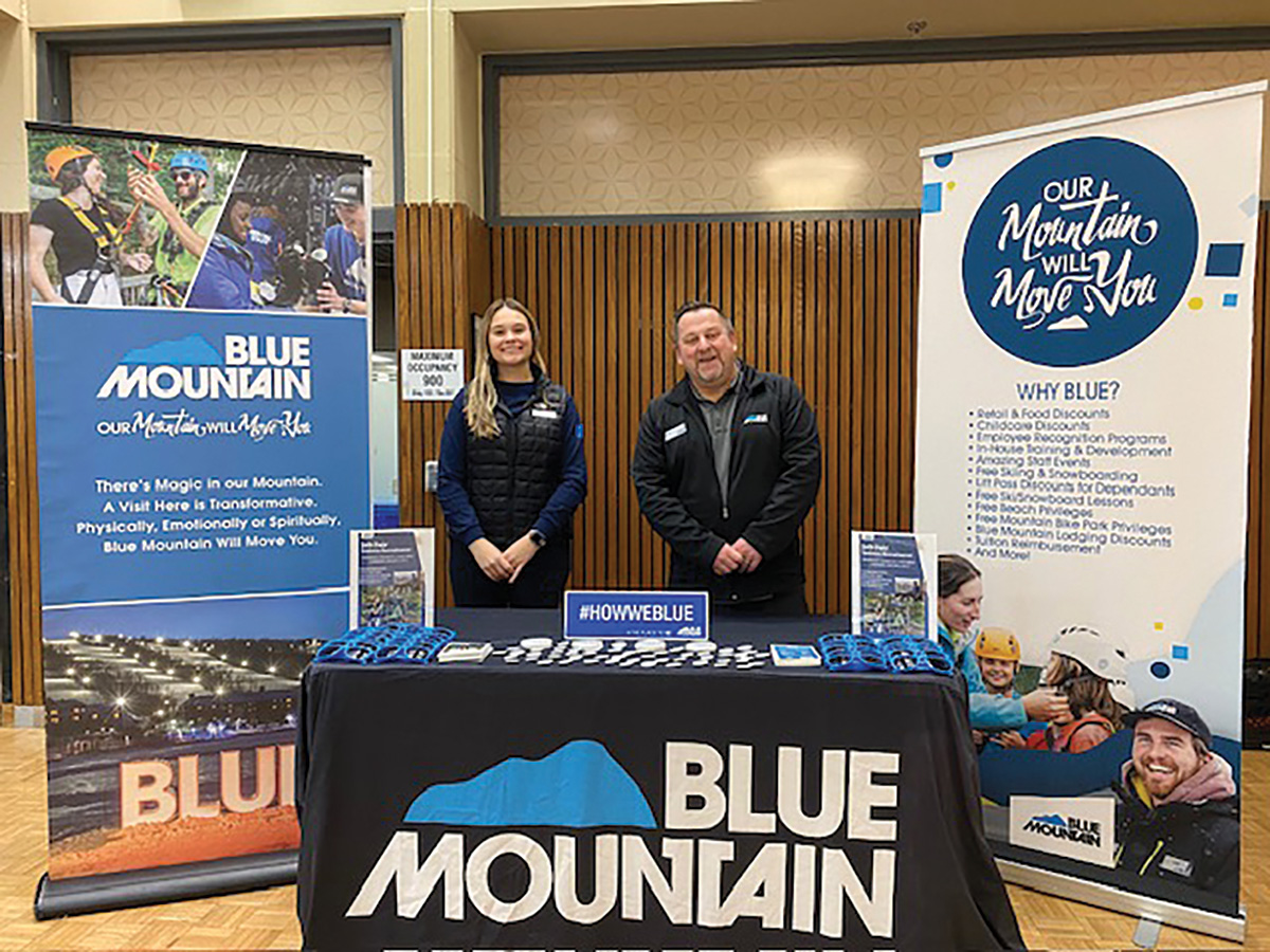 Blue Mountain recruiters Amy Trumpler and John Barrie at a job fair.