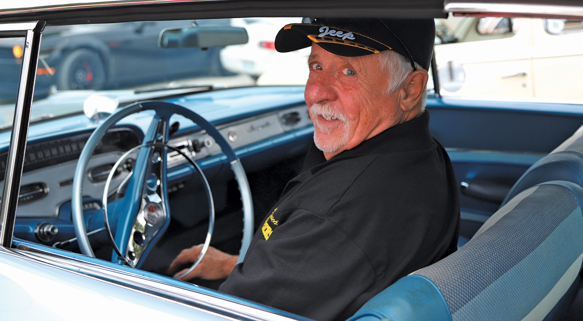 Ron Decoste behind the wheel of his ‘58 Chevy Impala.