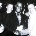 Louis Armstrong in Collingwood. Left to right: unknown, unknown, Buddy Brown, Roger Lockhart, Louis Armstrong, Sam Prezio, John Scheffer.