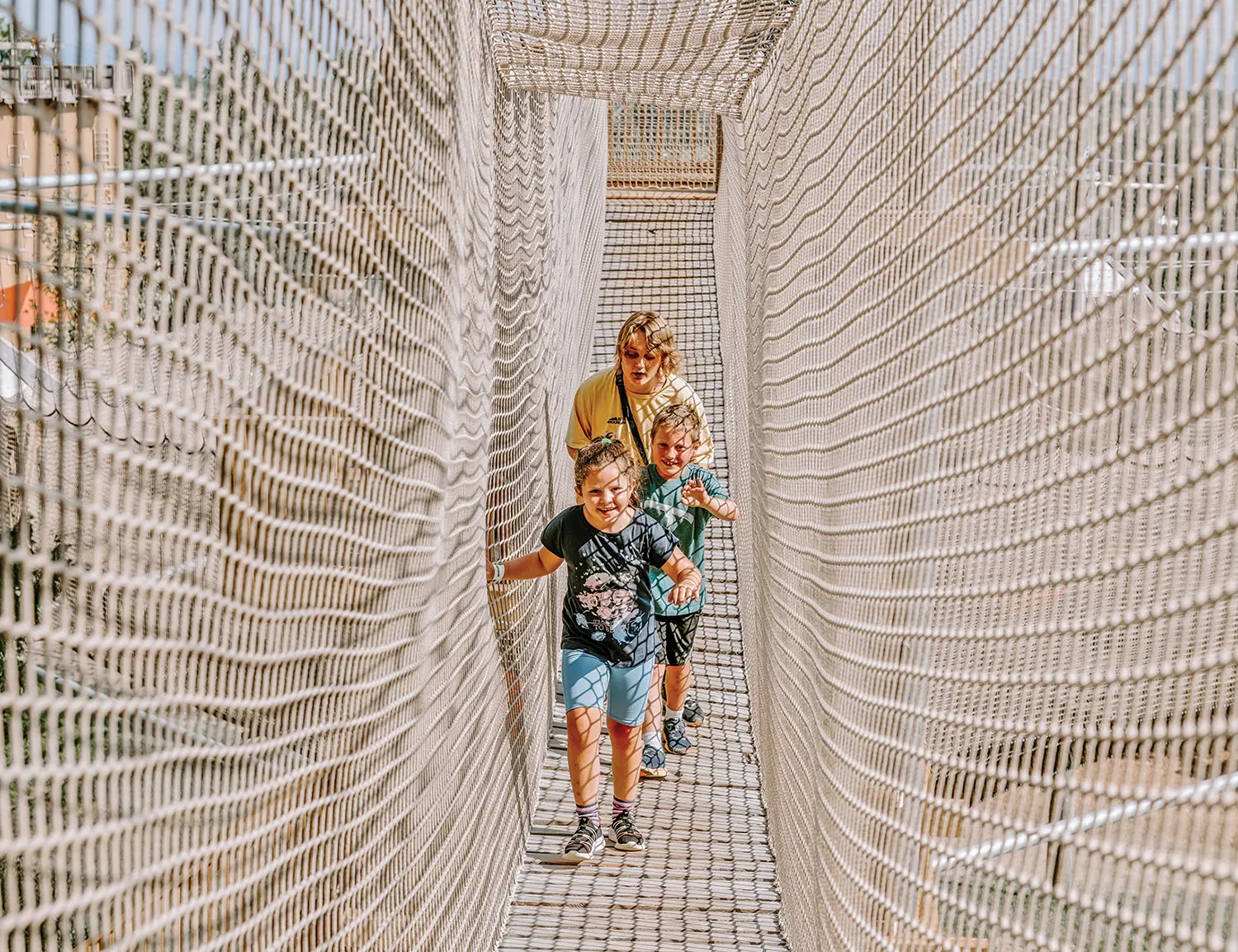 Campers having fun and making friends at Blue Mountain’s Beachside Camp and Canopy Climb Net Adventure.